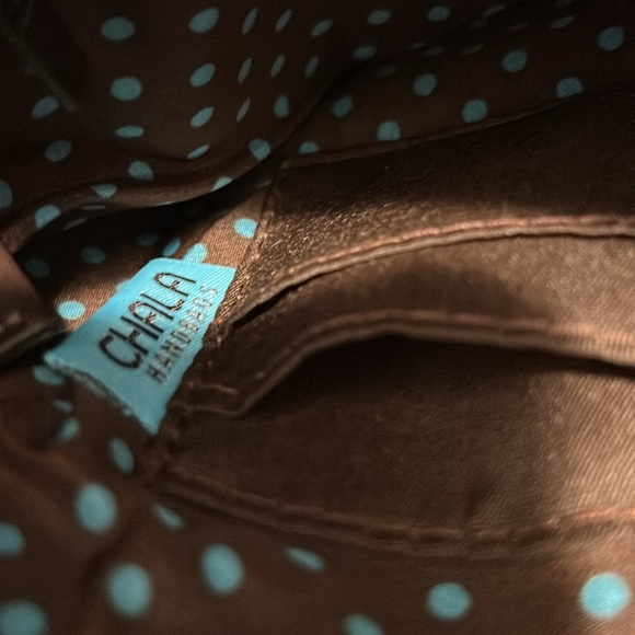 Chala Crossbody
Red Crossbody Bag with Paw Print Design
New with Tags - Picture 4 of 4